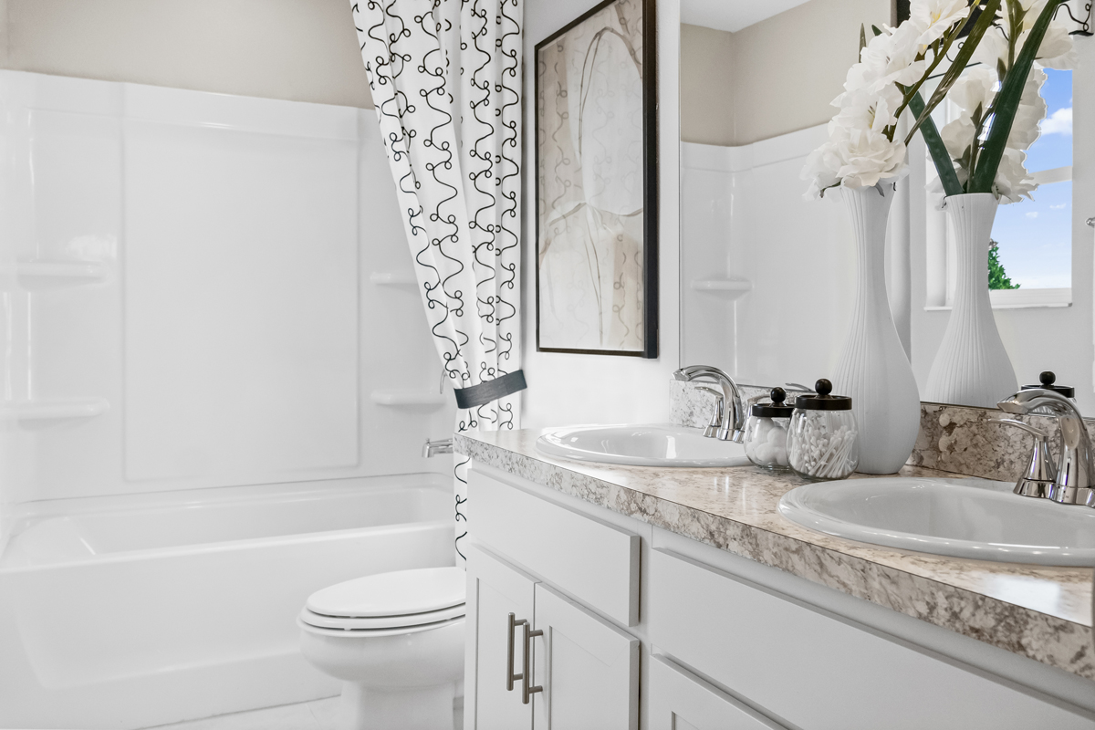 Dual-sink vanity at primary bath