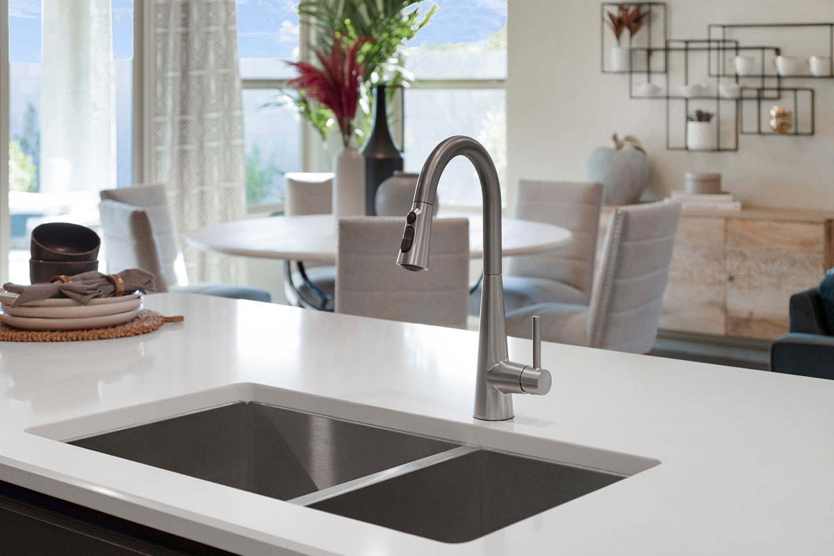 Double-basin undermounted kitchen sink