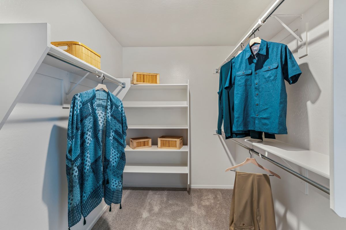 Walk-in closet at primary suite