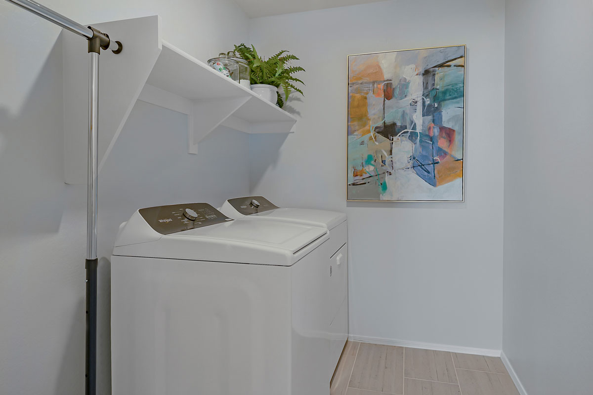 Dedicated laundry room on second floor