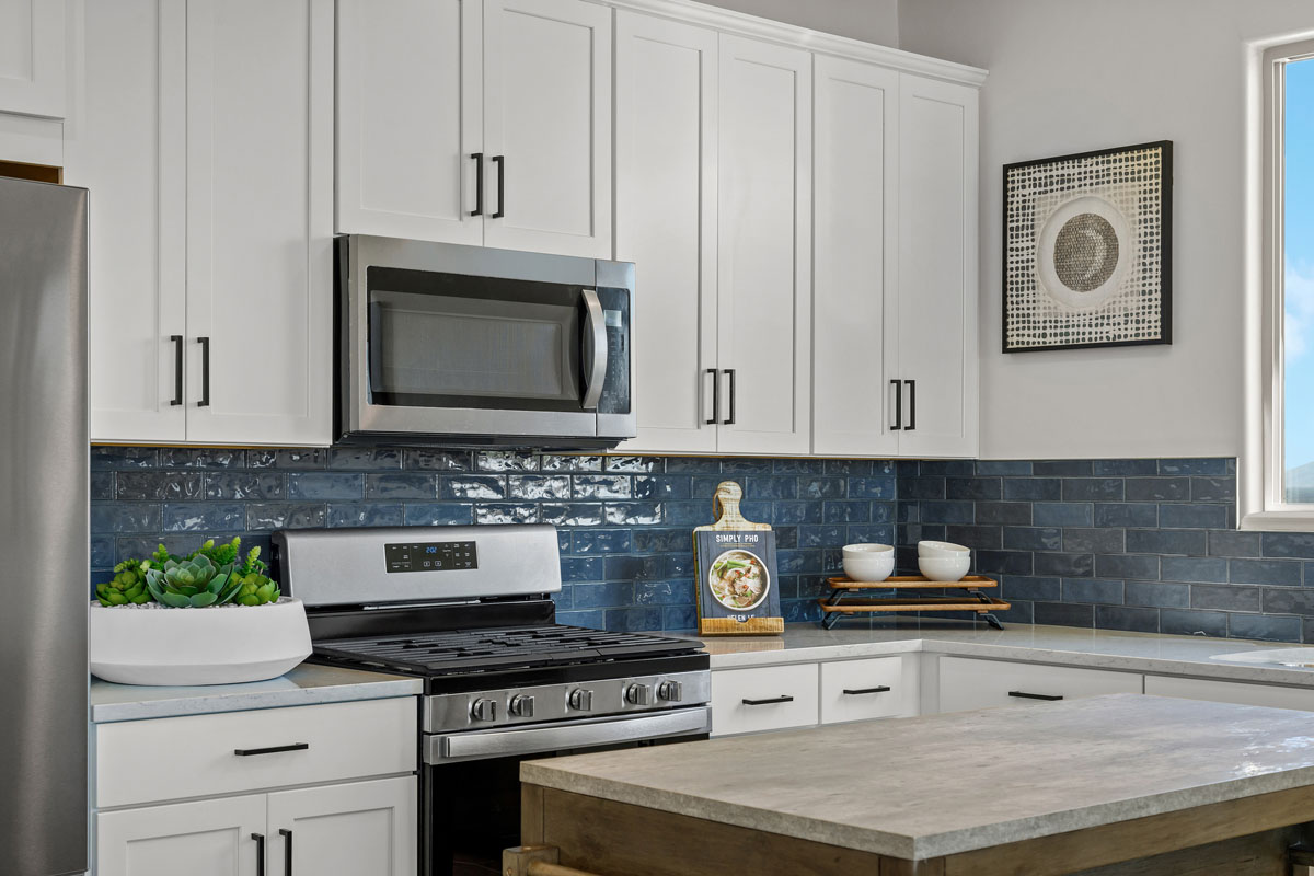 Tile backsplash at kitchen