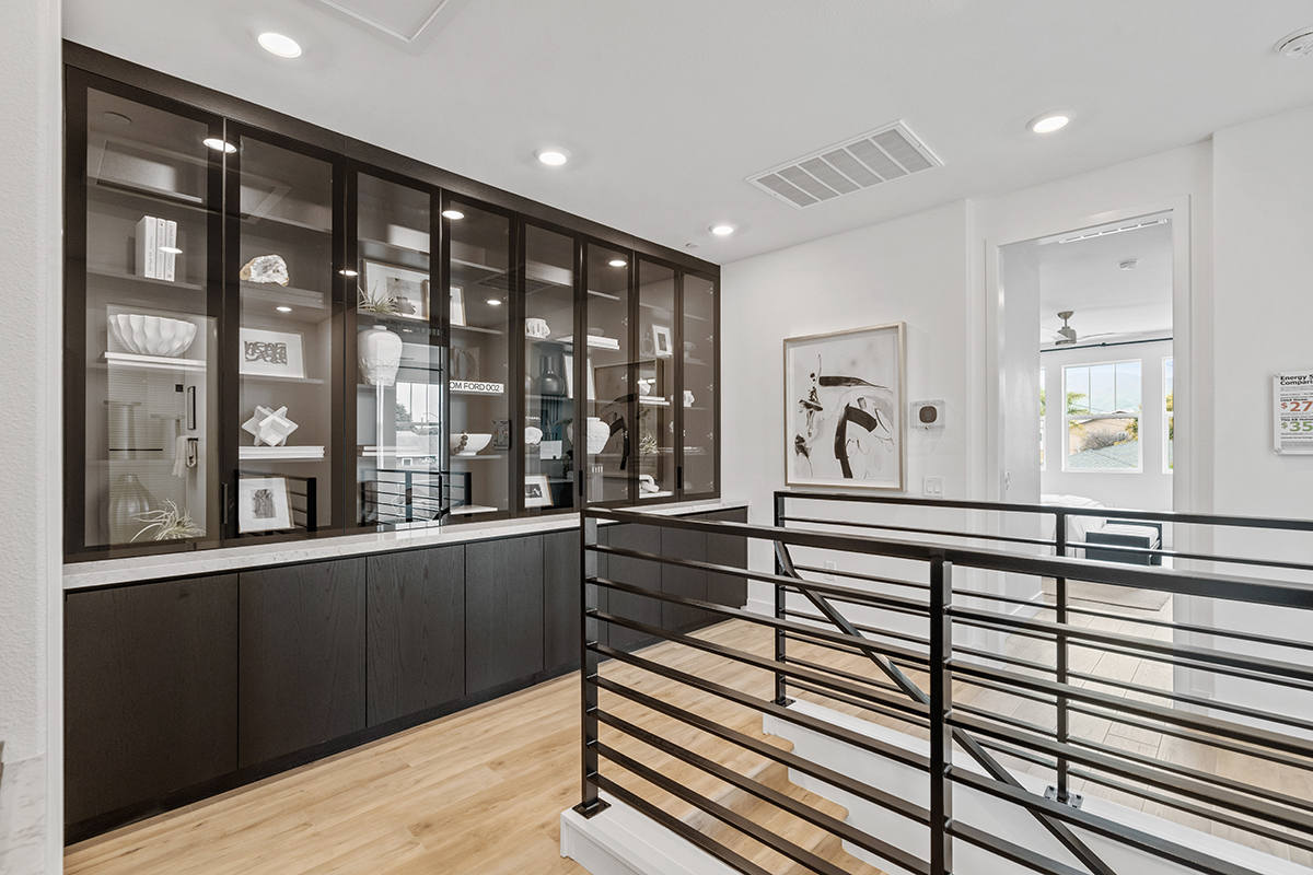 Curio cabinets at upstairs hallway