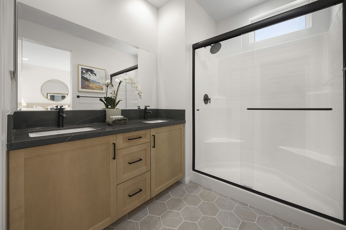 Full shower with optional matte black frame at primary bath