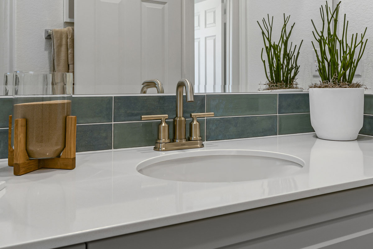 Upgraded bathroom faucet and tile backsplash