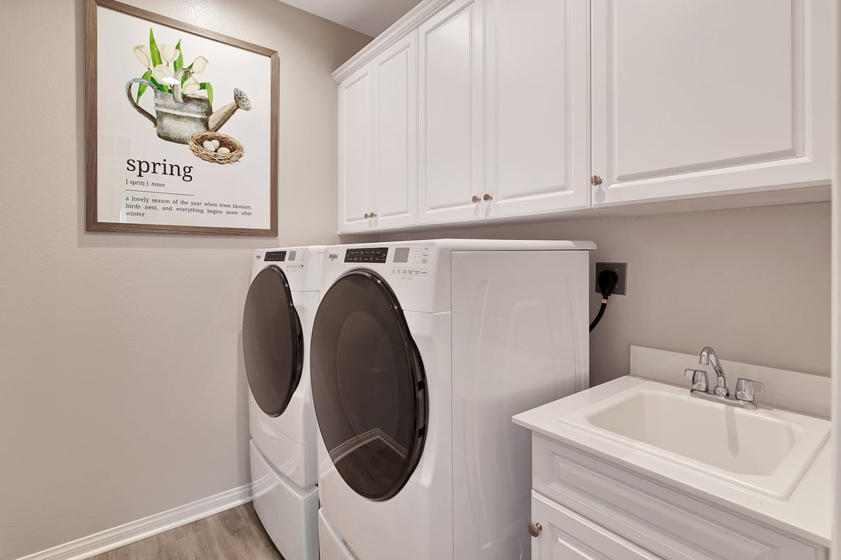 Upgraded laundry sink and cabinets