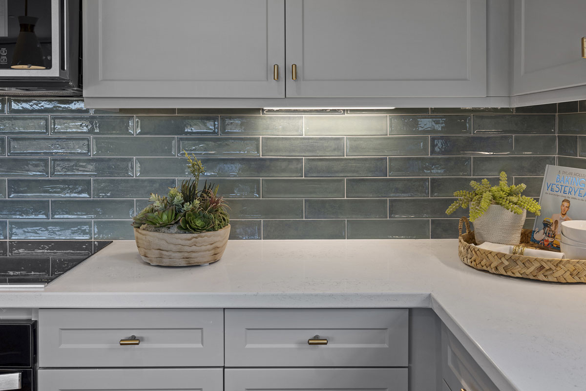 Optional quartz countertops and full tile backsplash