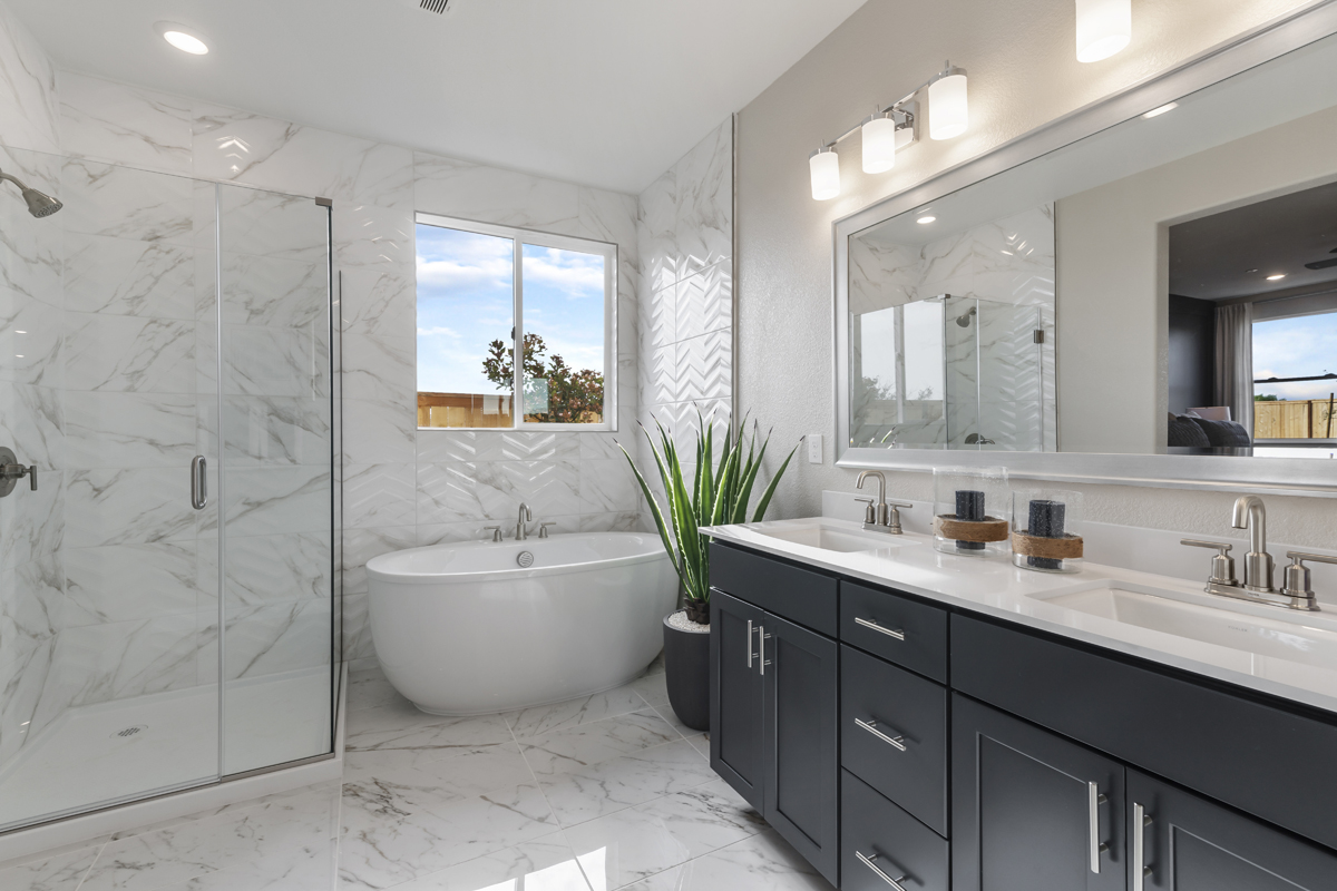 Freestanding soaking tub at primary bath