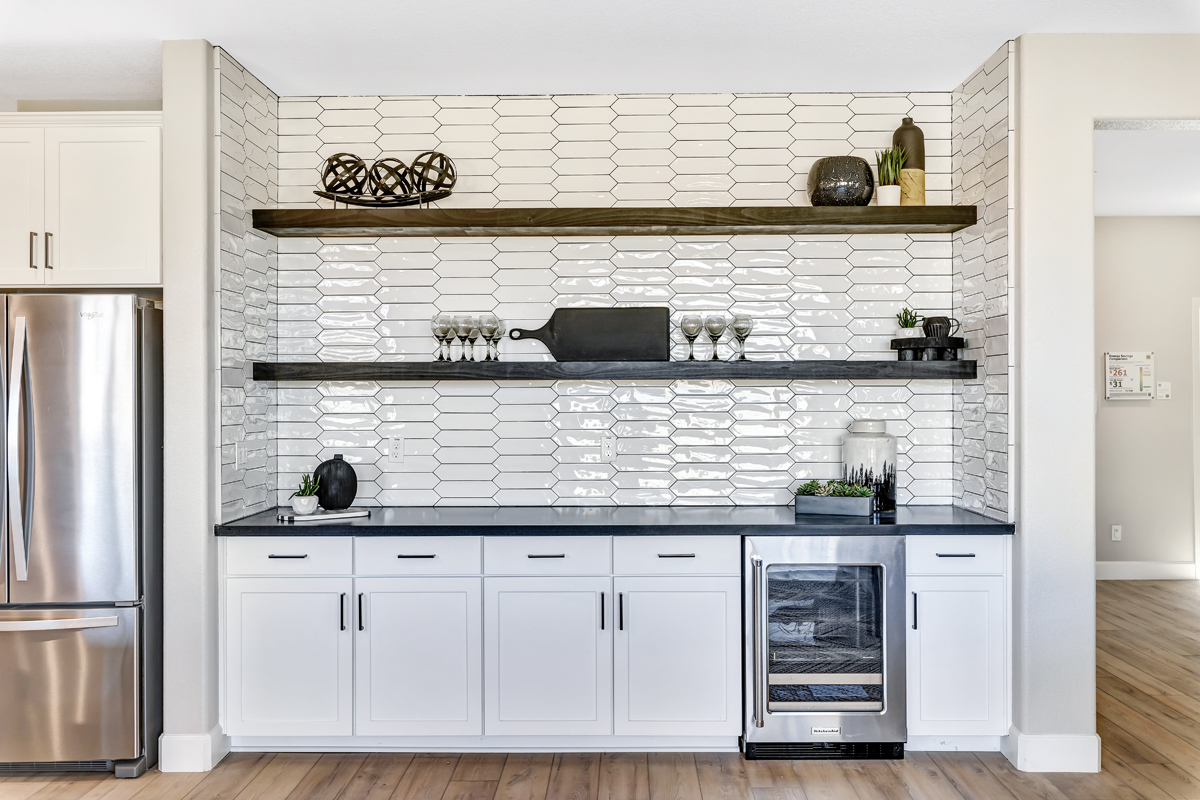 Upgraded cabinets in niche between kitchen and great room