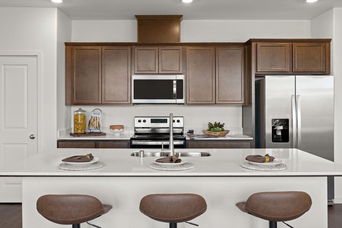 Quartz countertops and hardwood cabinets