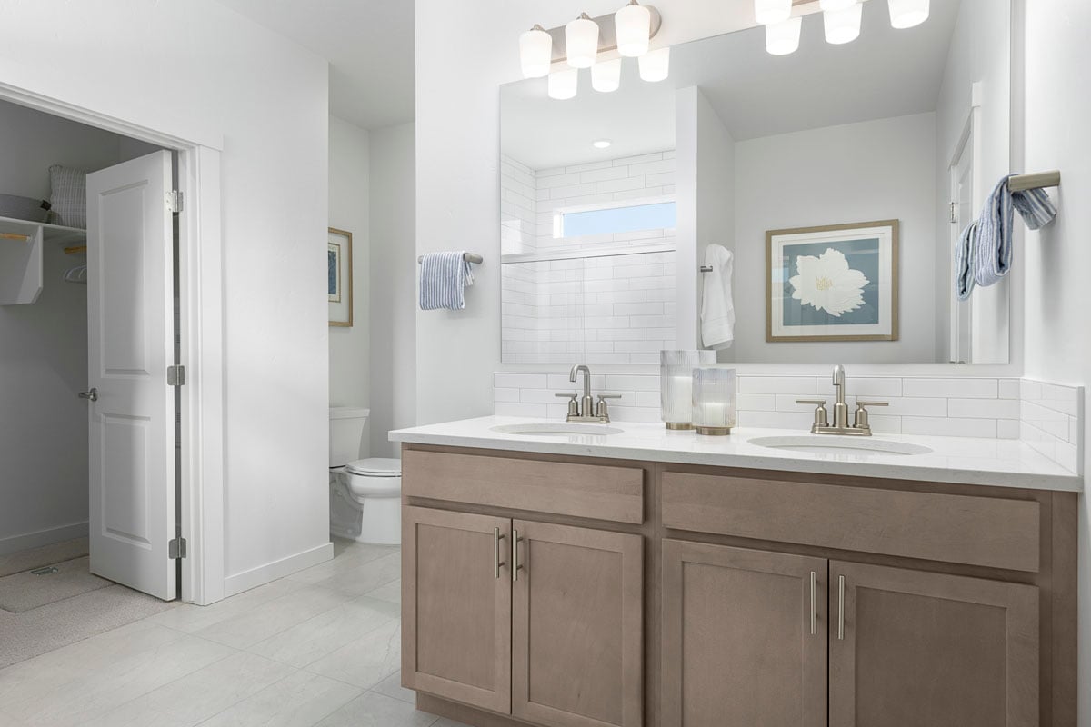 Dual-sink vanity at primary bath