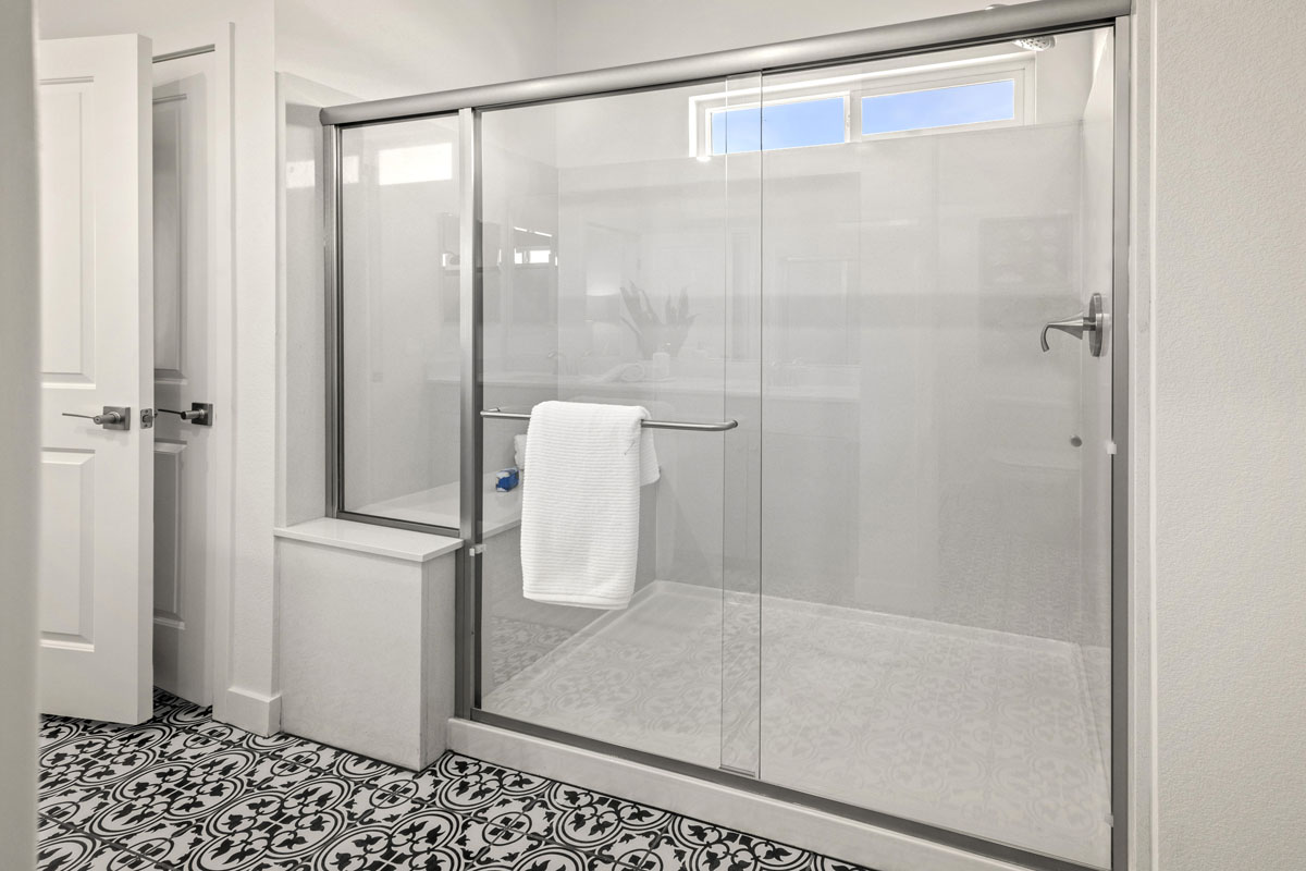 Enlarged shower with seat at primary bath 