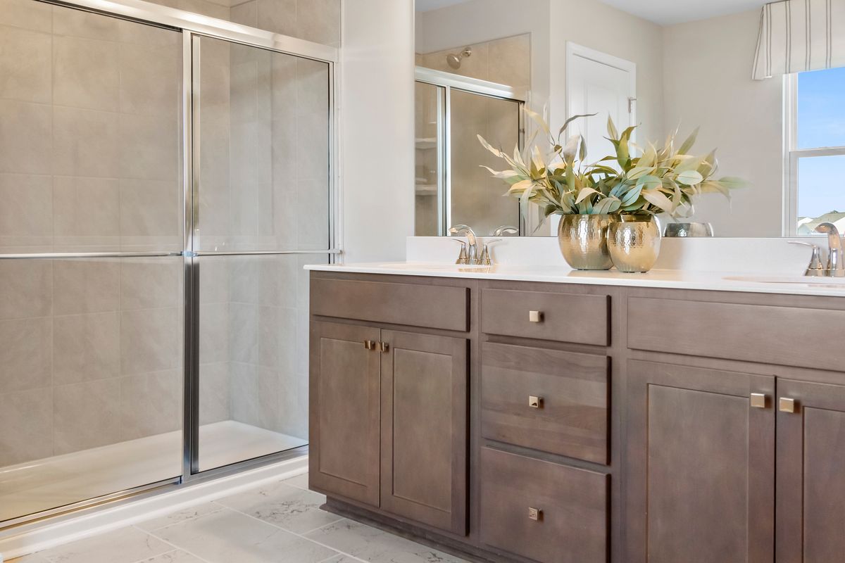 Dual-sink vanity at primary bath