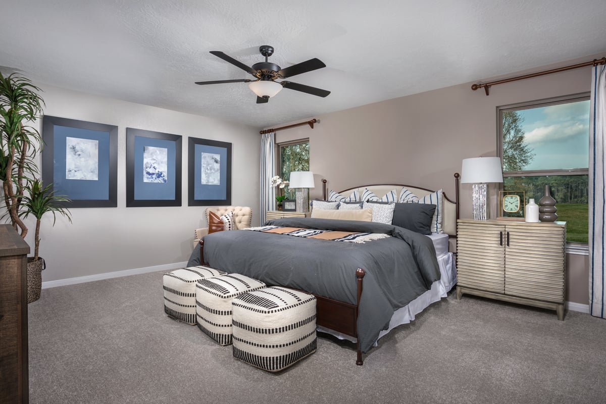 KB model home primary bedroom in Willis, TX