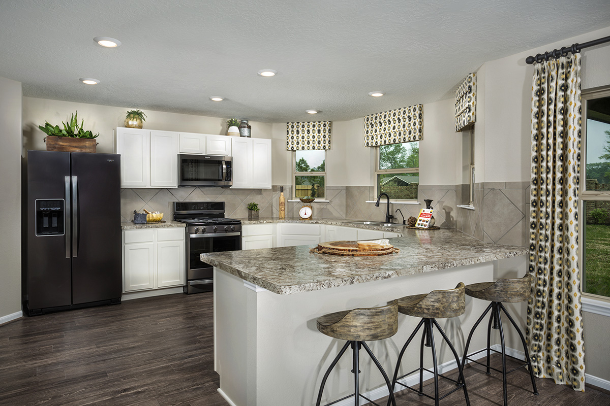 New Homes in Tomball, TX - Oakwood Trails Plan 2124 Kitchen