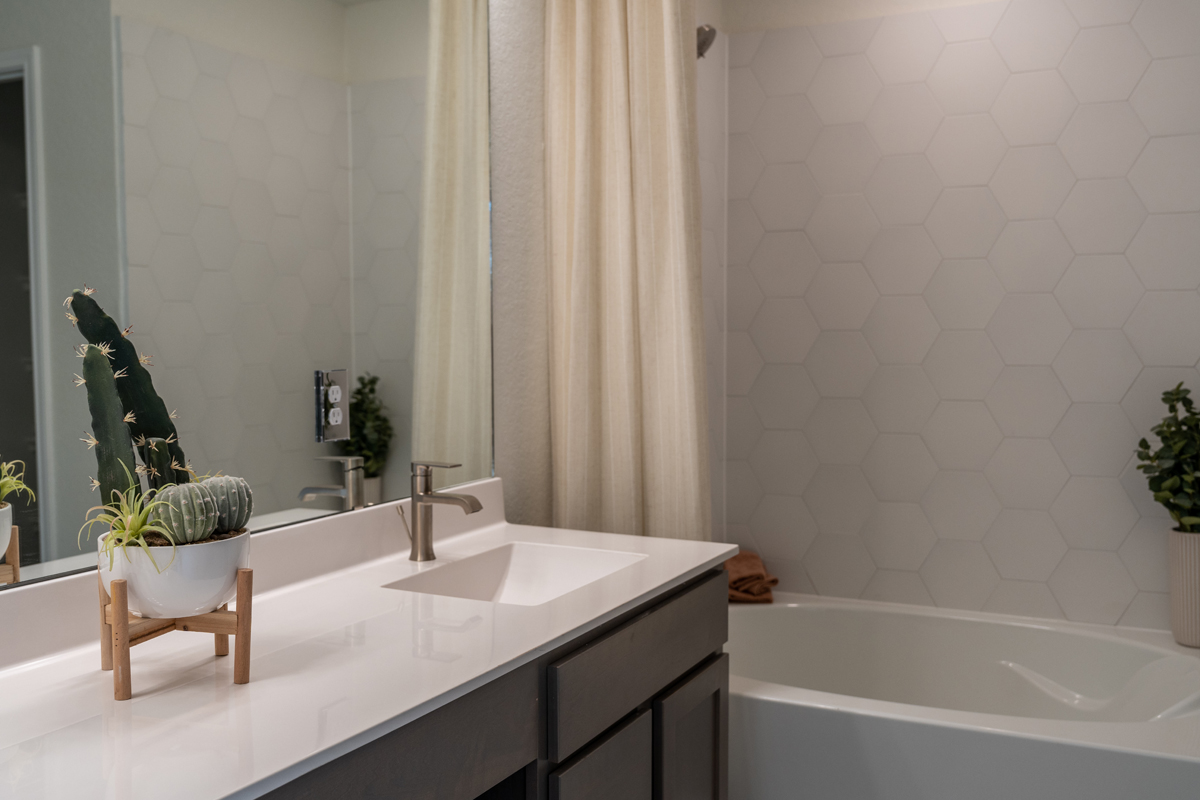 Sterling® Vikrell tub with Emser® Heska tile surround