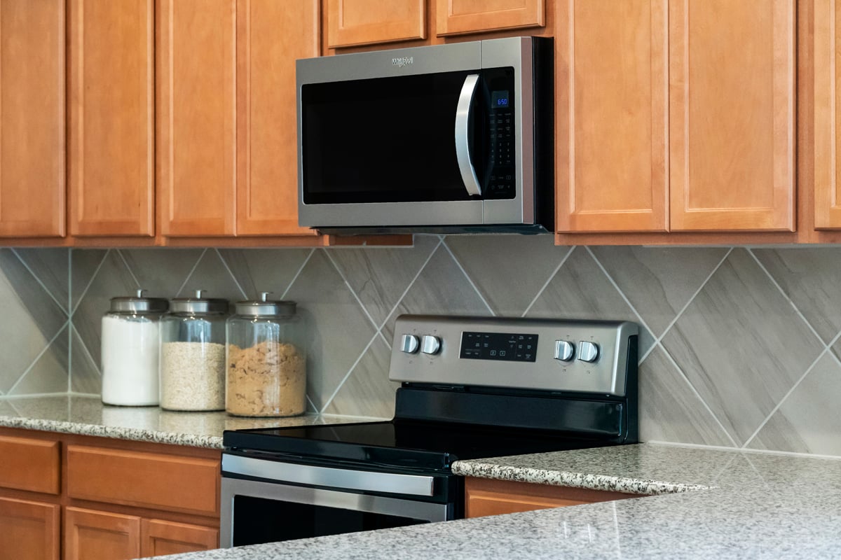 Whirlpool® glass top range and microwave/hood combo