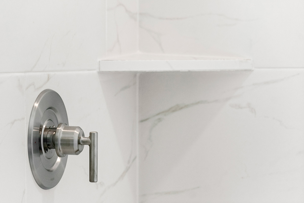 Shower with tile surround at primary bath