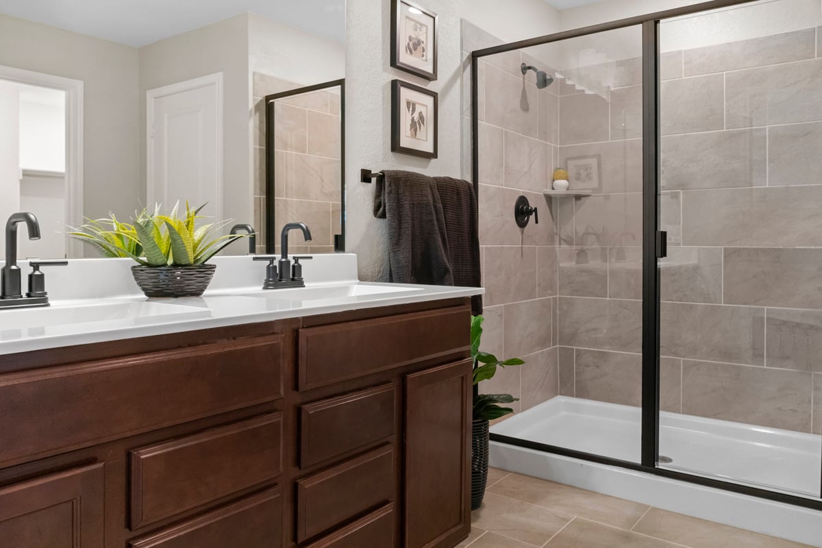 Shower with tile surround at primary bath