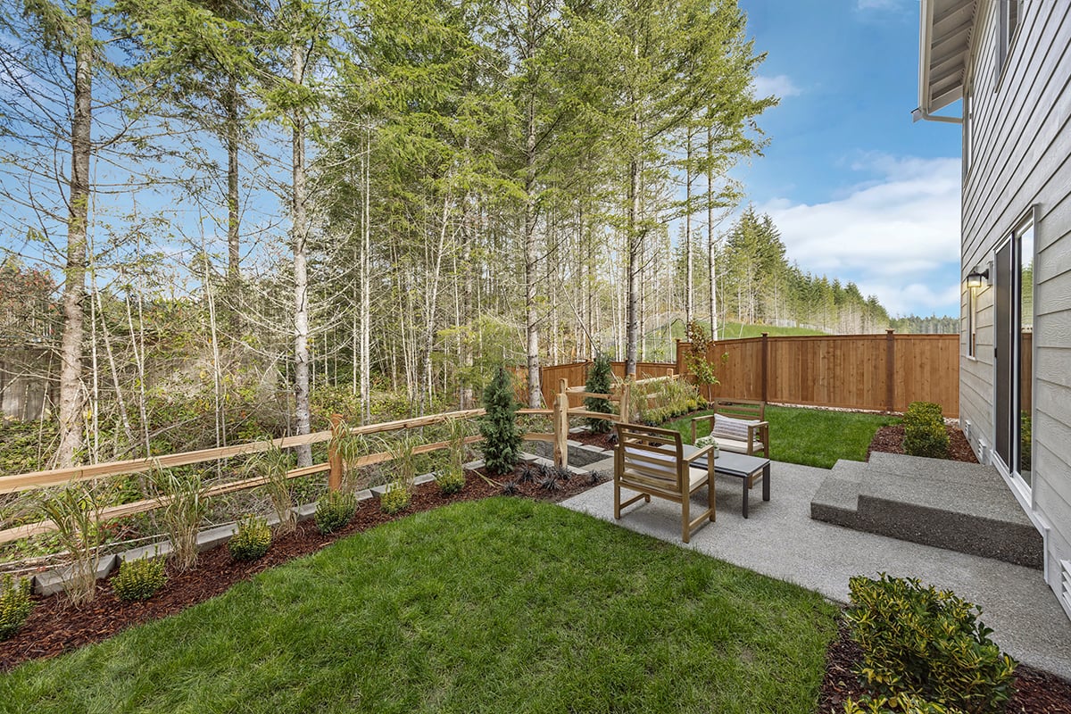 Landscaped and fenced backyard